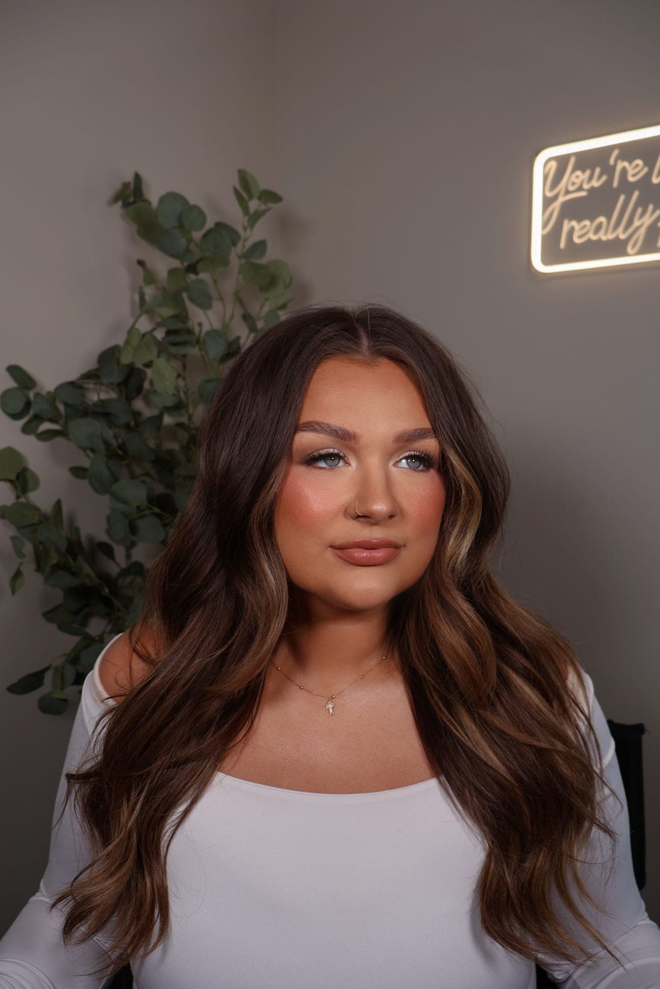 Bridal preview look in soft warm glam with a glossy nude lip